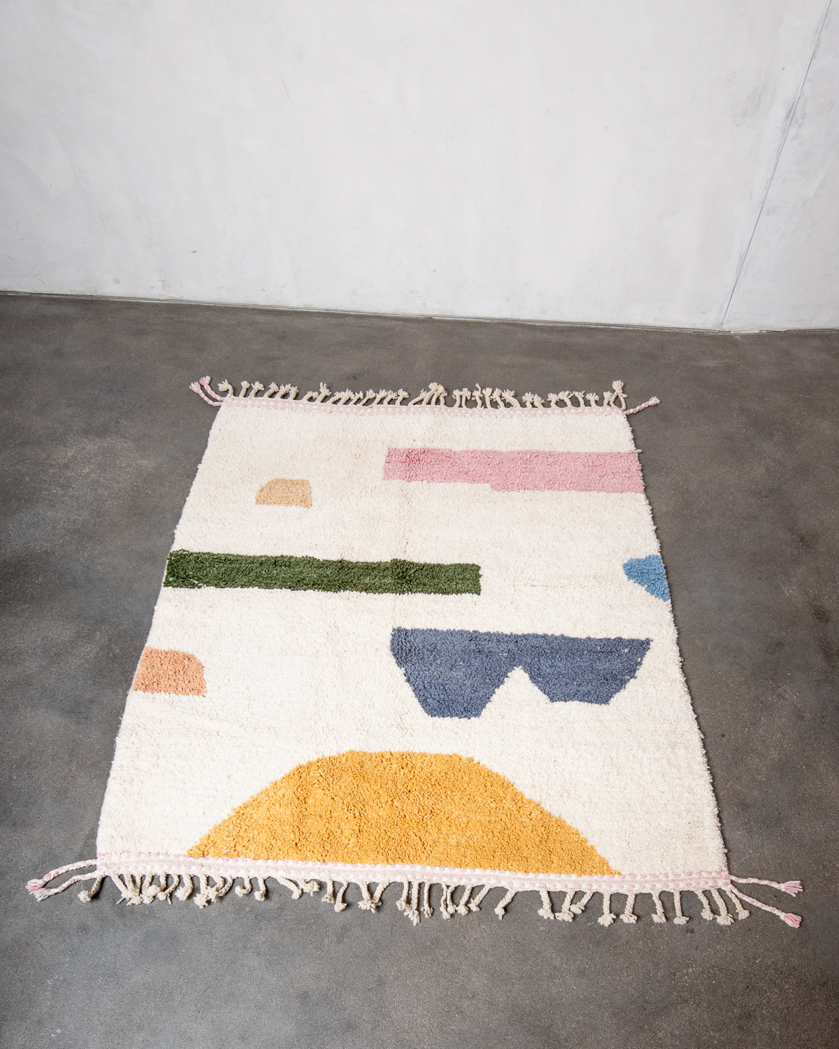 Modern, designer, handcrafted Berber rug from Morocco. Beniourain carpet with beautiful colours and patterns and fluffy wool texture.